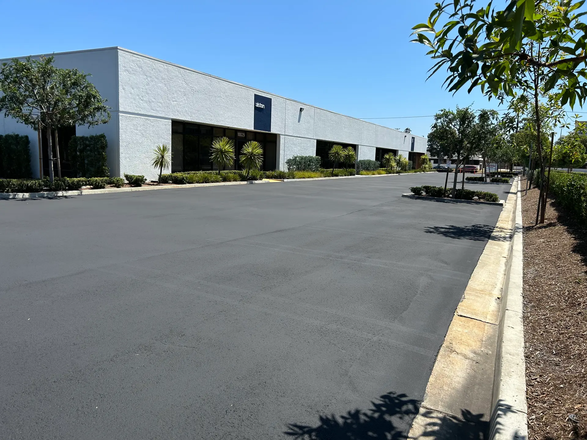 Smooth asphalt drive lane installation by Native Union Engineering